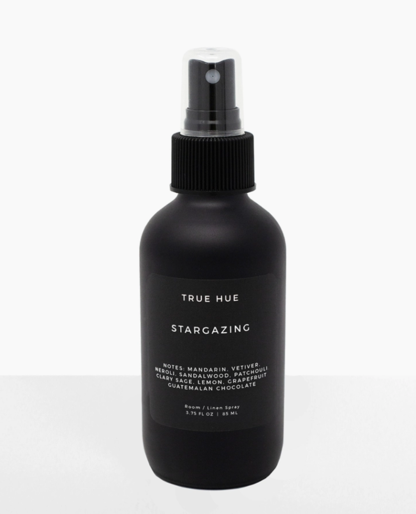 Black bottle of stargazing spray.