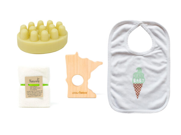 Collage photo of massage soap bar, bamboo washcloth, Minnesota teething toy, and baby bib with mint green and brown ice cream cone that says ice ice baby